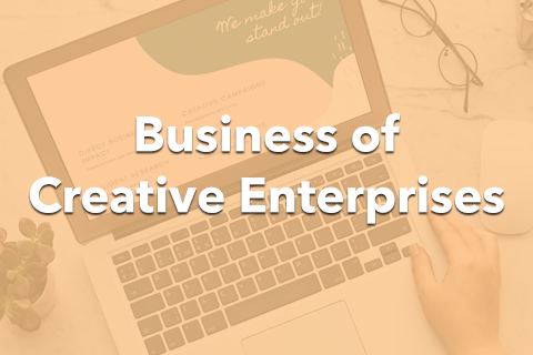 An image of someone typing at their laptop. Bold text is placed over the image. It reads: "Business of Creative Enterprises".
