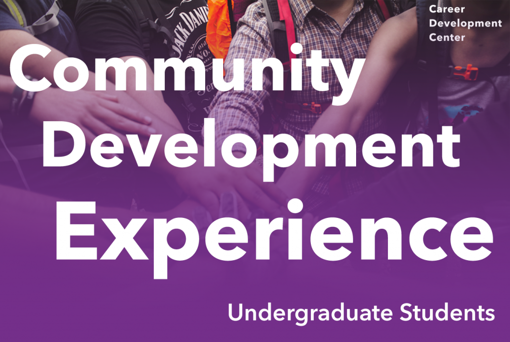 An image of several people joining hands. Bold text is placed over the image. It reads: "Community Development Experience".